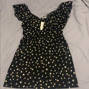 Black dress with yellow flowers.